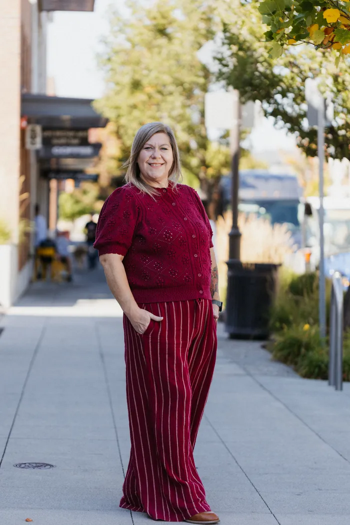Heather Seat, CPA, standing on a sidewalk